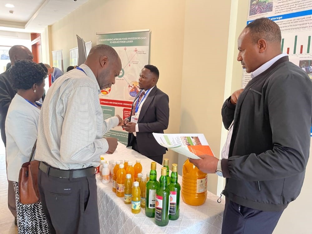 Some of the participants visiting the UON Exhibition at the Workshop